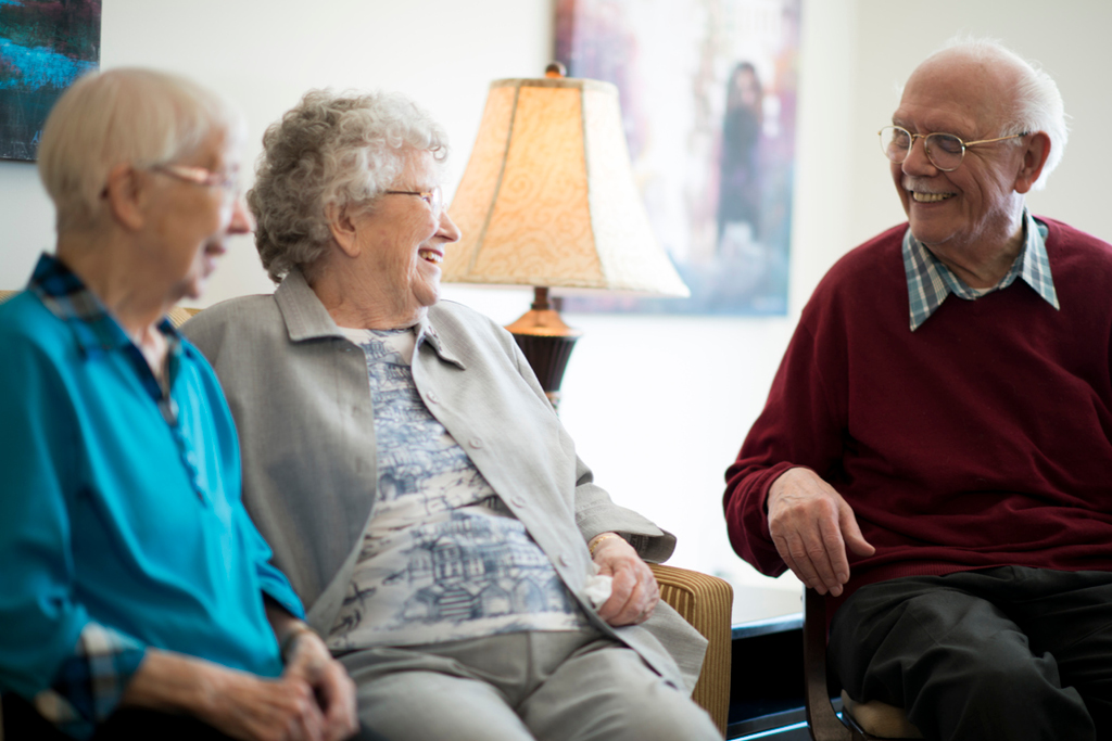 Group of residents interacting and laughing with each other