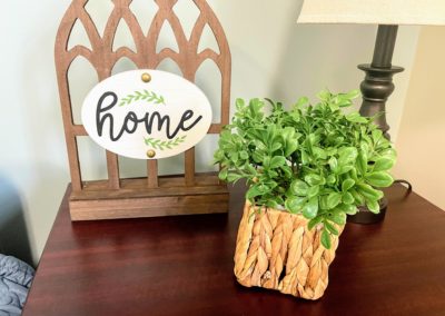 Memory Care Unit resident room with green accented decorations