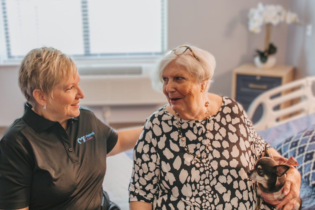 Homepage - Home Health Blurb Medical professional and resident embracing each other and smiling for the camera